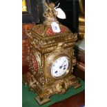 An attractive antique French brass bracket clock with chiming movement and cherub mount - 36cm high