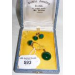 A jade pendant, ring and clip-on earrings set