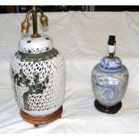 A decorative oriental table lamp and one other