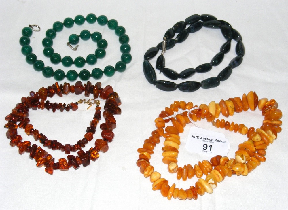 An old amber necklace? together with three others