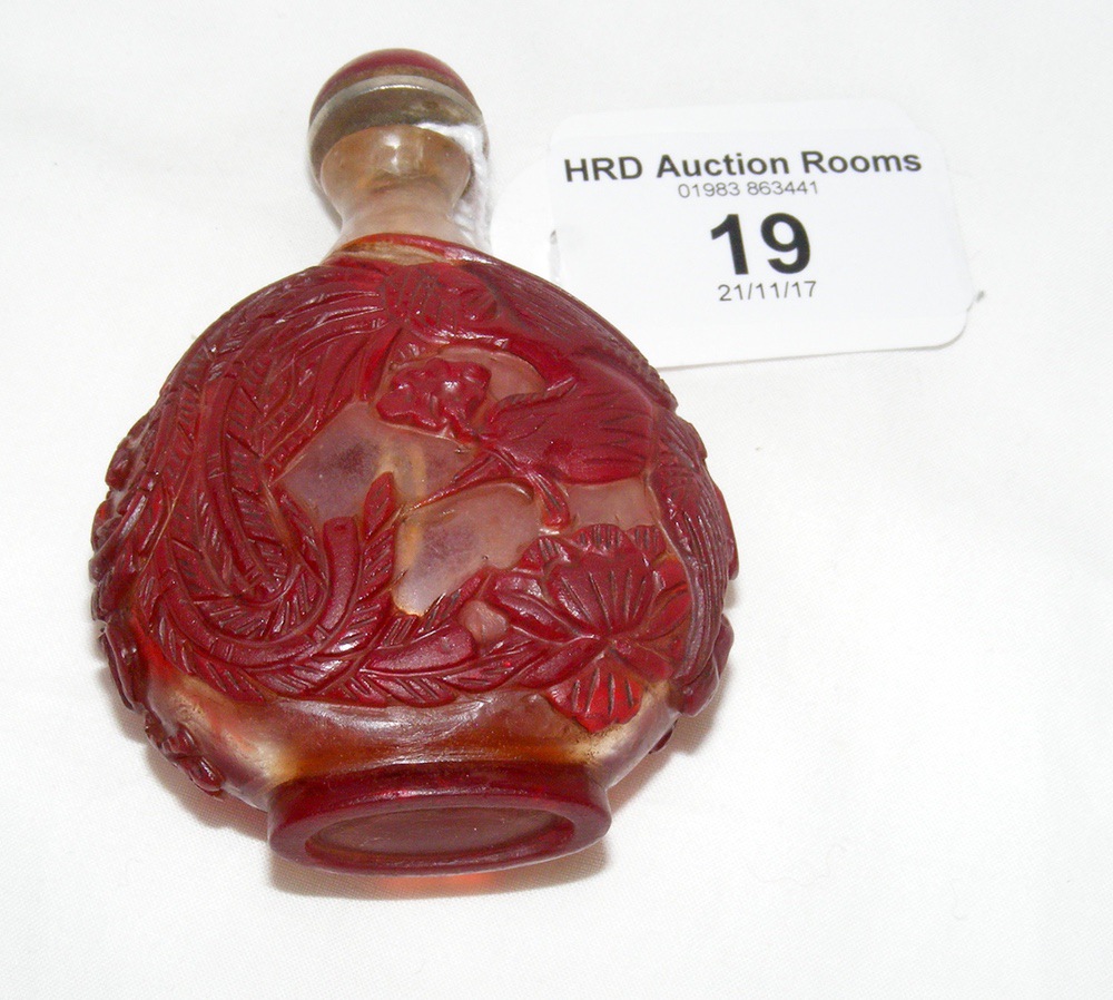 A red overlay (Peking glass) Chinese snuff bottle with glass top and ivory spoon - 7.5cm