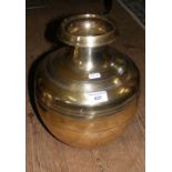 A brass vase with turned decoration - 34cm high