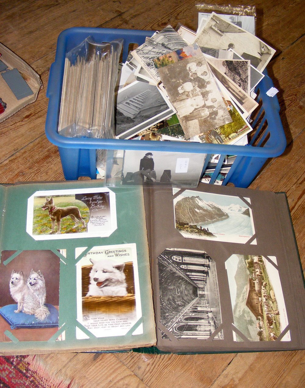 Interesting postcard album, together with large selection of loose postcards