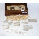 A box of oriental Mother of Pearl and ivory games counters