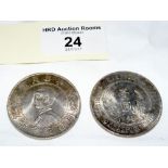 Two 4cm diameter silver Chinese coins