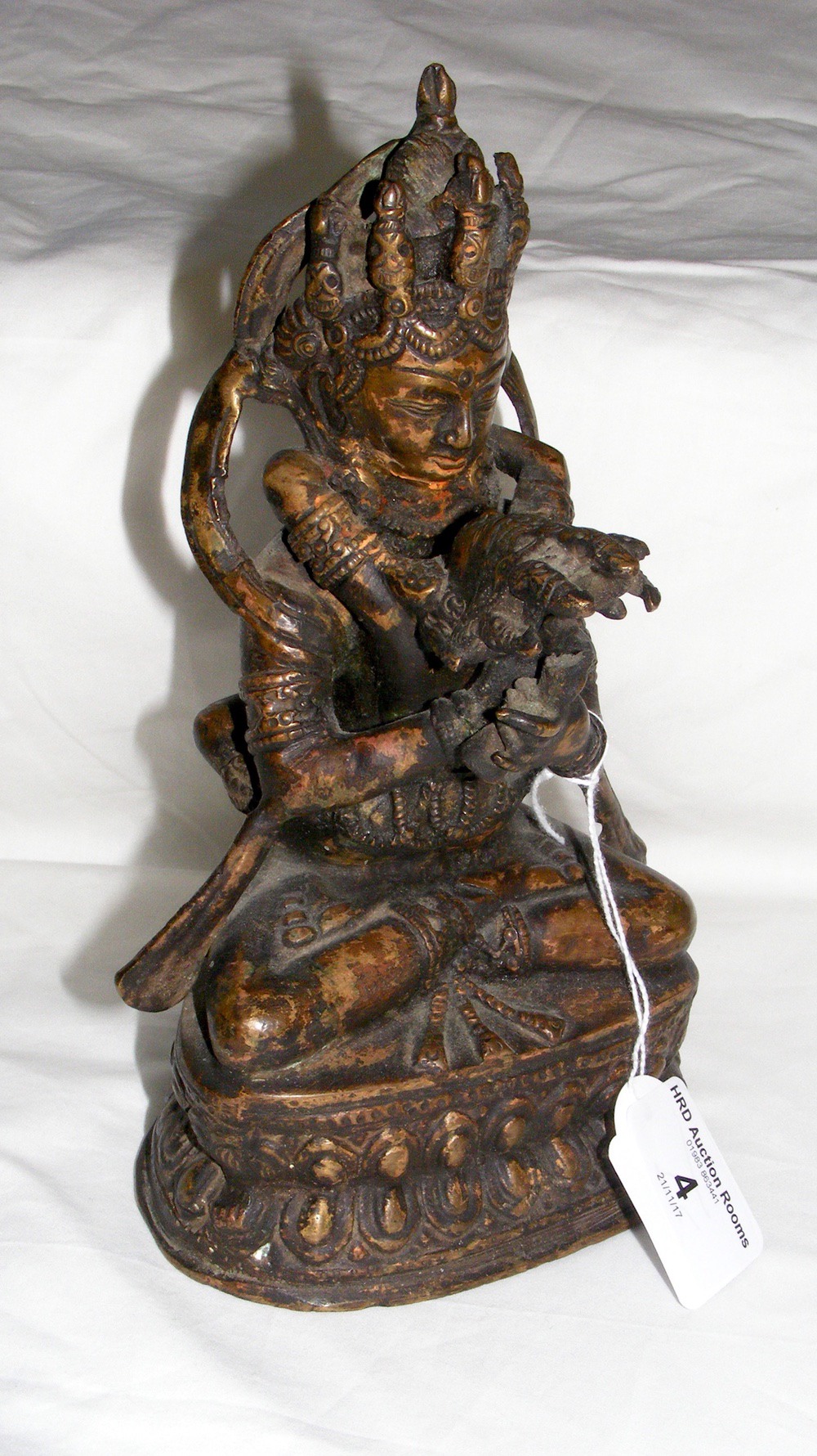 A Sino-Tibetan gilt bronze of couple in flagrante, possibly 17th century - 21cm tall
