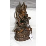 A Sino-Tibetan gilt bronze of couple in flagrante, possibly 17th century - 21cm tall