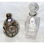 Silver mounted decanter with stopper, together with a silver "thistle" design mounted decanter
