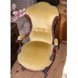 A lady's elegant antique drawing room chair with cabriole front supports
