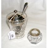 An Art Deco style silver top and cut glass marmalade jar, together with a silver rimmed jar