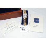 A Raymond Weil lady's 18ct gold diamond mounted wrist watch, having Mother of Pearl face, original