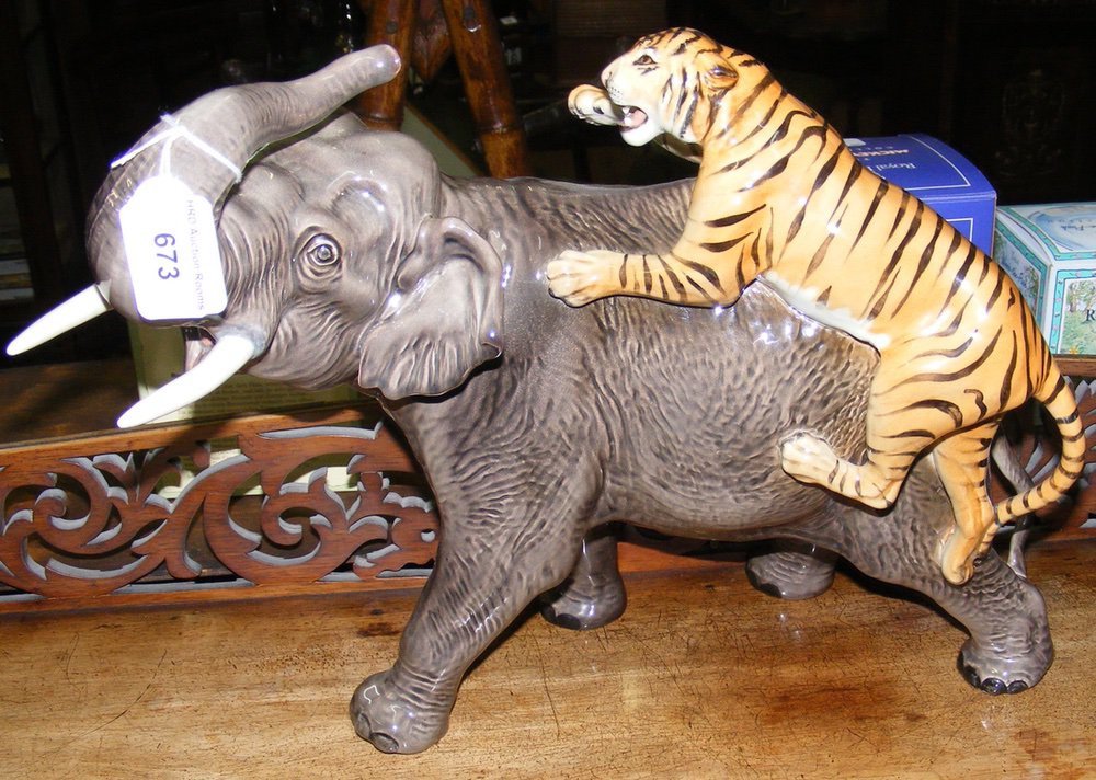 A large Beswick Elephant ornament with Tiger attacking - 32cm high