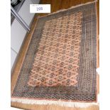 Middle Eastern style rug with geometric border - 130cm x 180cm