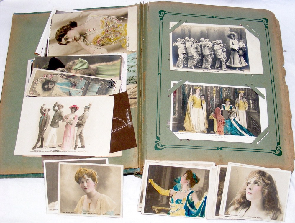 An album containing various collectable postcards