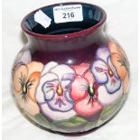 A Moorcroft pottery vase with pansy decoration - 15cm high - with mark to base