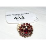 A garnet cluster ring in 9ct gold setting