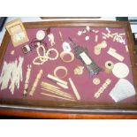 A good selection of carved ivory, jewellery and ivory collectables