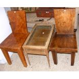 A pair of country style heavy side chairs, together with a glass top display cabinet