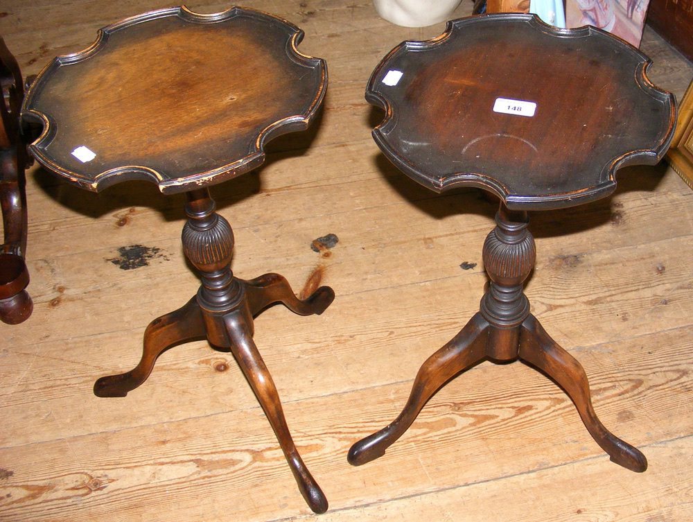 A pair of mahogany wine tables