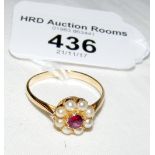 A ruby and pearl cluster ring in 18ct gold setting