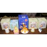 A boxed Royal Doulton Disney character, together with four others