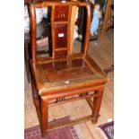 A Chinese hardwood side chair with decoration to the backrest