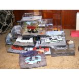 Boxed die-cast model vehicles, including Ford and other