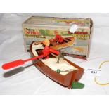 A Tri-ang Minic clockwork rowing boat with original box