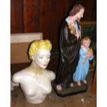 Fibreglass bust of nude female, together with a plaster figural group of Jesus and child