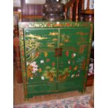 A decorative Chinese Shimu two door cabinet with Shanxi painted figure, flower and butterfly design