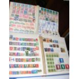An album containing collectable stamps from around the world and one other