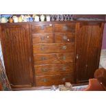 Gent's mahogany combination wardrobe with drawers to the centre