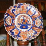 A 46cm diameter Imari charger with floral decoration