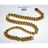 A 9ct gold curb link necklace - 48g
