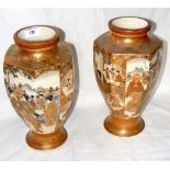 A pair of 30cm high good quality Satsuma vases with signatures to base on wooden stands