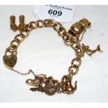 A 9ct gold charm bracelet - 32g