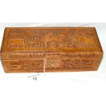 A sandalwood jewellery box with highly carved oriental scenes - 24cm x 9cm