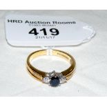 A sapphire and diamond ring in 18ct gold setting