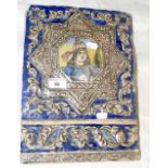 An antique Persian tile - the central figure in raised star design - 35cm x 26cm