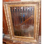 A large gilt framed wall mirror - 120cm x 88cm