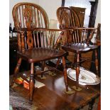 A pair of country stick back armchairs