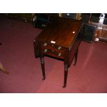 A 19th century mahogany worktable on turned supports (upstairs)