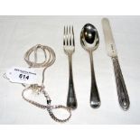 A silver knife, fork and spoon set, necklaces