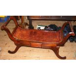 A pair of Regency style stools with cane work seats - each 120cm long