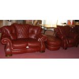 The matching two seater settee, armchair and pouffe