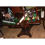 A 19th century mahogany drop-leaf breakfast table with single drawer