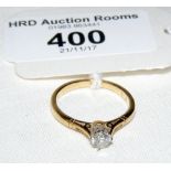 A diamond Solitaire ring in gold setting