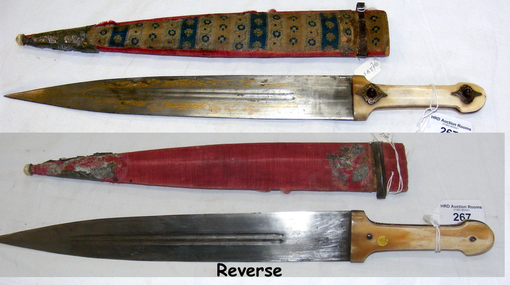 A Middle Eastern dagger with gold coloured decoration to the blade - 42cm long