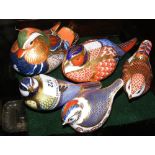 A Royal Crown Derby Duck paperweight, together with four others