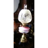 Victorian oil lamp with pink glass reservoir